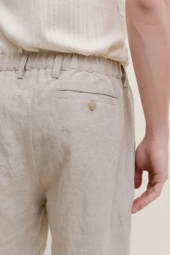 ELASTICATED WIDE TROUSERS